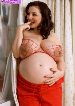 49274208 015 1d2d 256x362 - Pregnant chick wearing fishnet lingerie Lorna Morgan exposes her massive big boobs