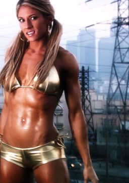 Female Hard Body Marie posing in gold gym wear 7 256x362 - Female Hard Body - Marie posing in gold gym wear